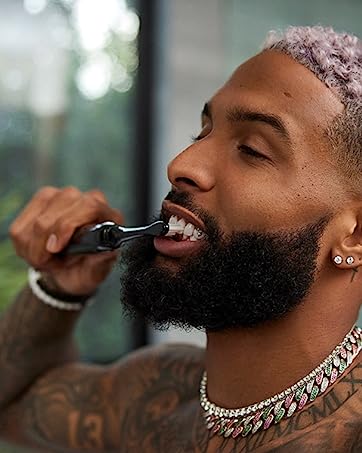 OBJ Using the Moon Electric Toothbrush